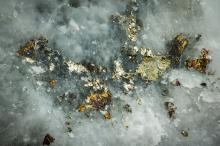 Pyrite. Macro detail texture background. Close-up polished semi-precious gemstone