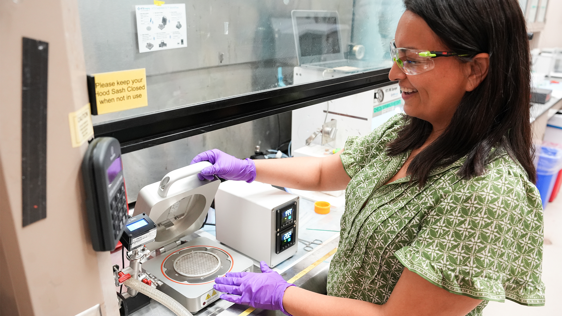 Photo of researcher Abigail Moreno working with lab equipment.