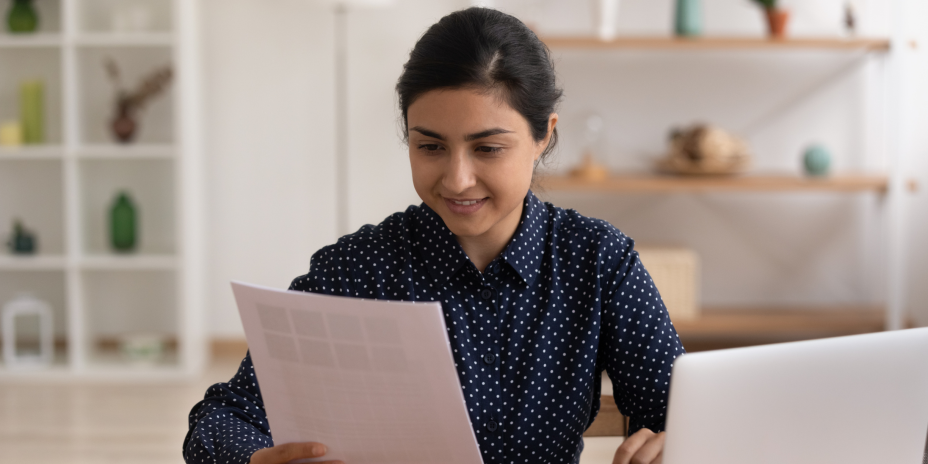 Person holding paper.