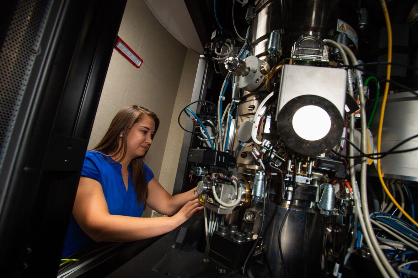 Researcher with instrument