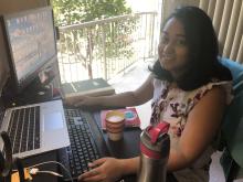 Aditi Sengupta sits at a computer during EMSL Summer School 