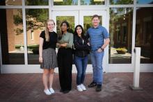 Kate Eddy, Oyshi Taluker, Yasamin Alazawi, and John Lindquist stand in front of the Environmental Molecular Sciences Laboratory