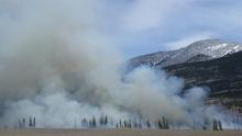 Mountains with rising smoke