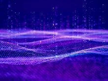 Abstract digital wave composed of glowing particles. Vertical light trails float above the surface, creating a futuristic atmosphere.