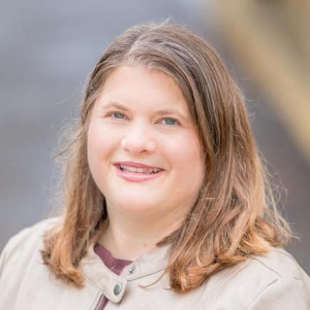 photo of a person named Jana Thayer with brown shoulder length hair