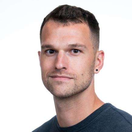 Headshot photo of researcher Nicholas Reichart.