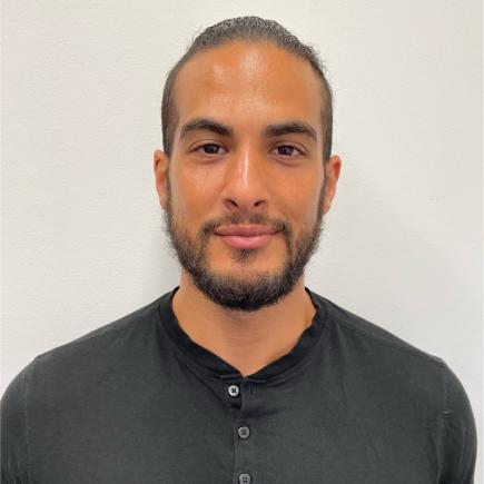 Headshot photo of researcher Yasin Torres-Tiji.